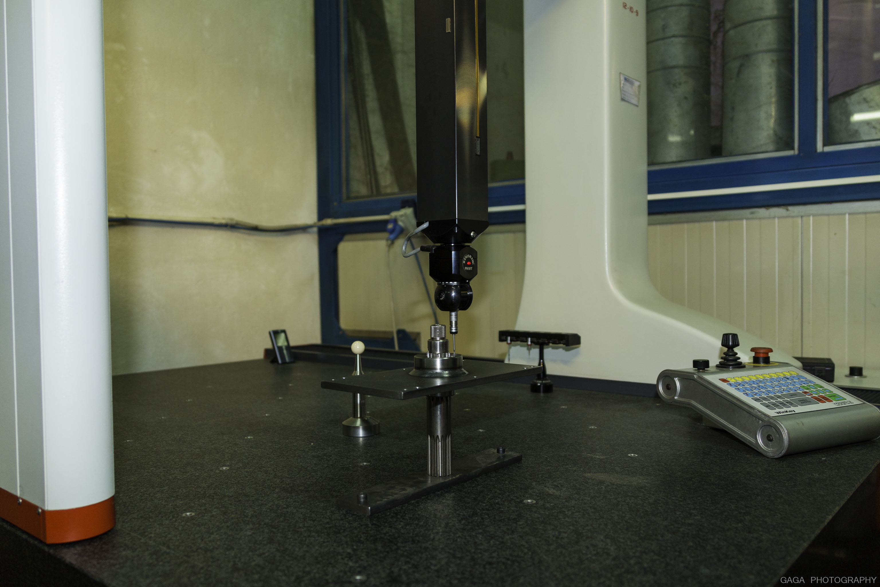 CMM measurement probe on precision component